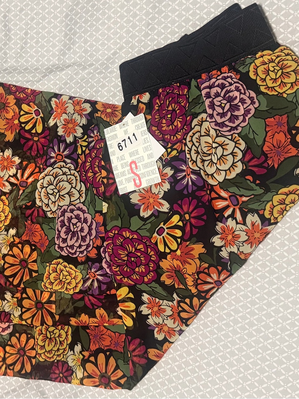 LuLaRoe Lola Shirt Multicolor Floral with Black Waistband Size Small